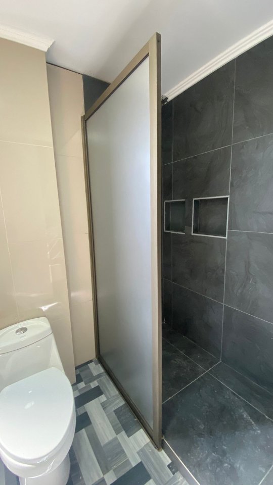 División de baño Chile