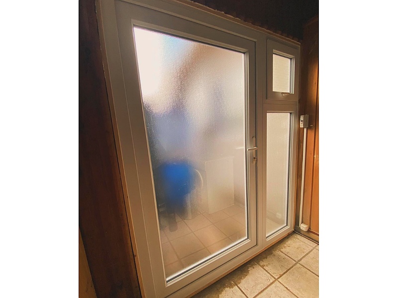 Puerta termopanel con vidrio semilla Chile