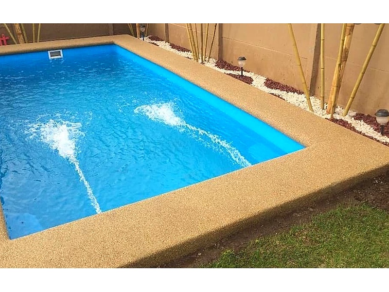 Piscina con revestimiento en grano fullget Chile