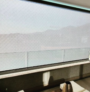 Ventana con persiana automatizada Chile